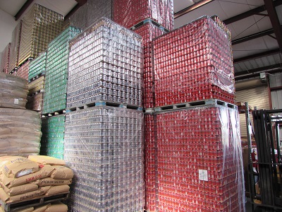 finished beer cans stacked on pallets